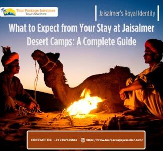 two mens sitting with camel at jaisalmer desert camps with bornfire